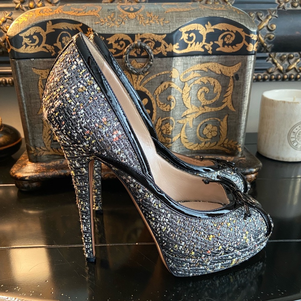 Casadei tweed/boucle with patent detailing peep toe pumps.